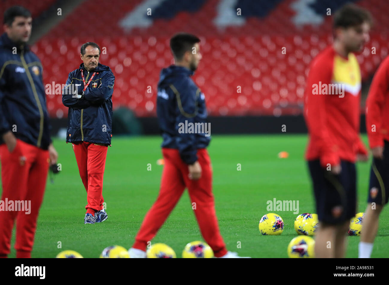Montenegro head coach Faruk Hadzibegic (centre) during the training session at Wembley Stadium, London. Stock Photo