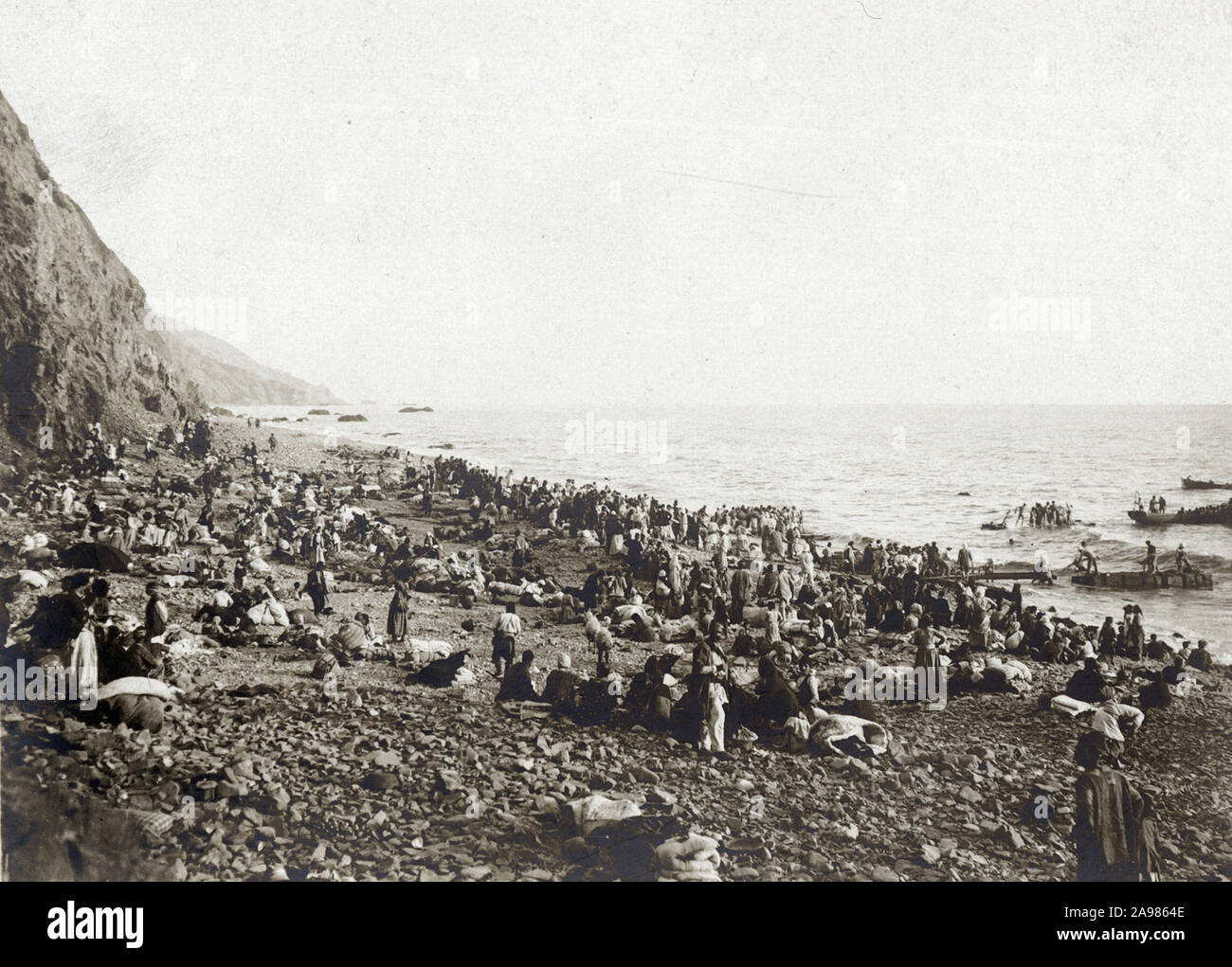 Armenian refugees waiting on a beach, probably in the Antakya Bay, Turkey, before an evacuation to Port Said, Egypt, by French and British warships. September 1915. Stock Photo