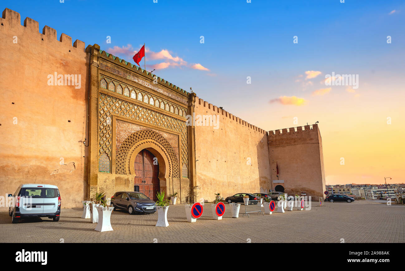 View of El Hedim square with ancient gate Bab El-Mansour and ancient walls in Meknes. Morocco, North Africa Stock Photo