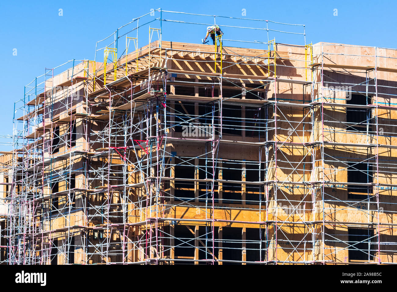 Multifamily residential building under construction in Sunnyvale; the entire Silicon Valley and San Francisco Bay Area has faced a housing crisis, wit Stock Photo