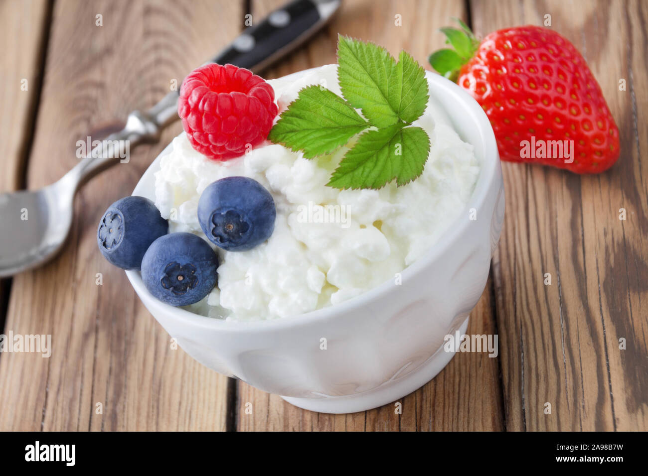 Cottage cheese and fruits Stock Photo Alamy