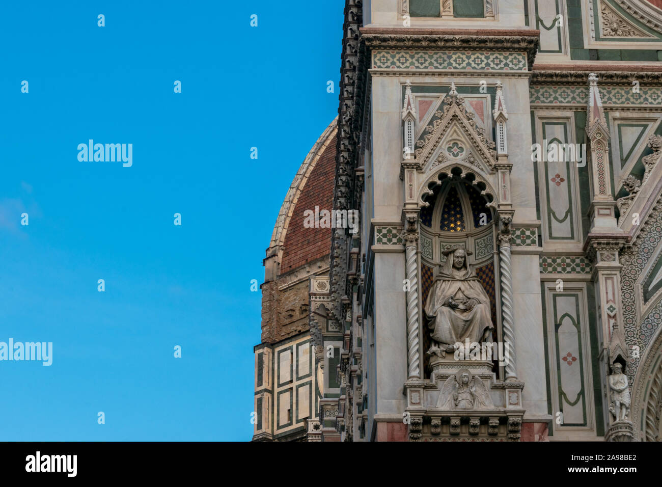 Statue on the wall of the Cathedral of Santa Maria del Fiore in Florence, Tuscany, Italy Stock Photo