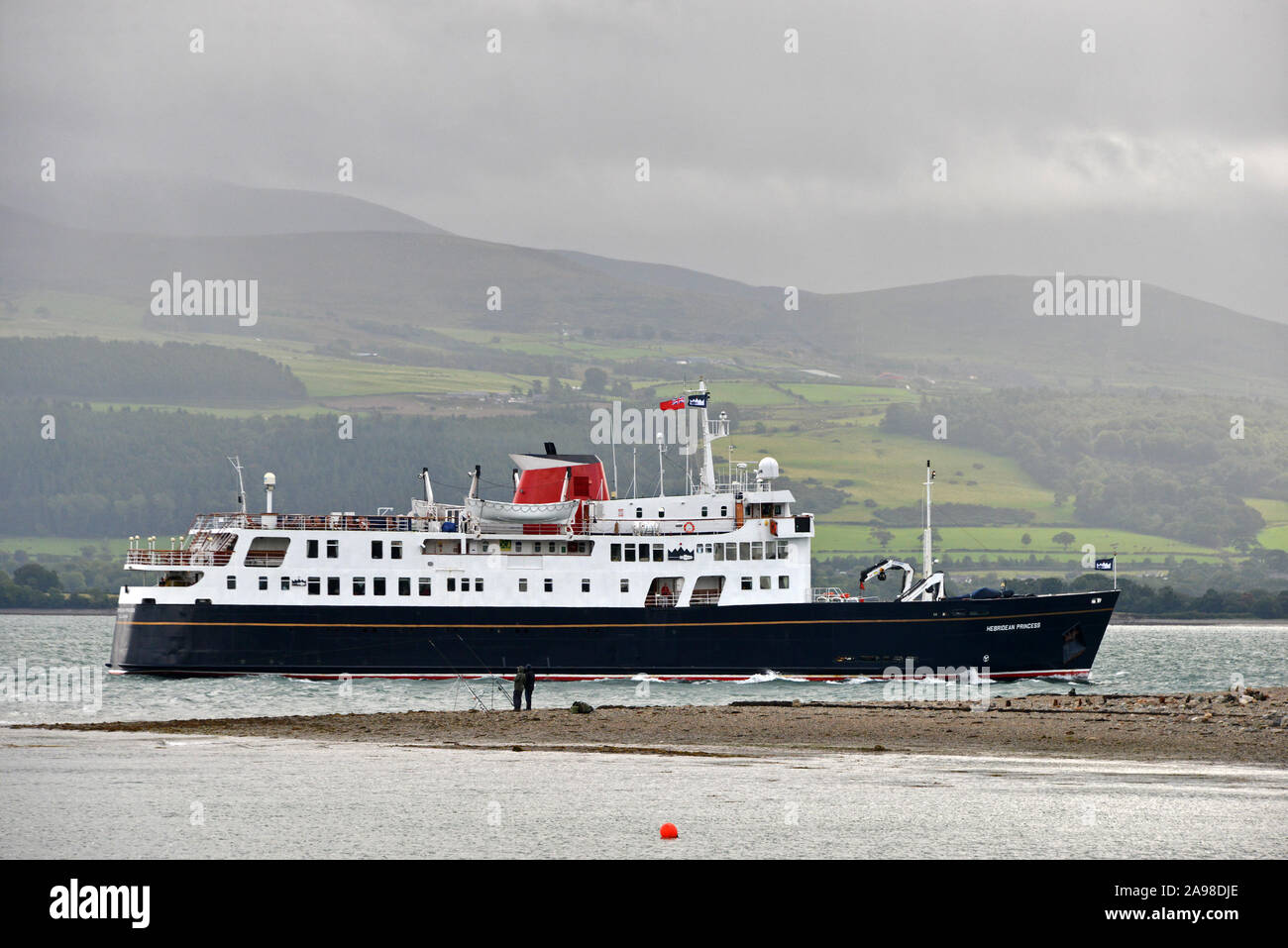 HEBRIDEAN PRINCESS passing GALLOWS POINT, Beaumaris, Anglesey, North Wales Stock Photo