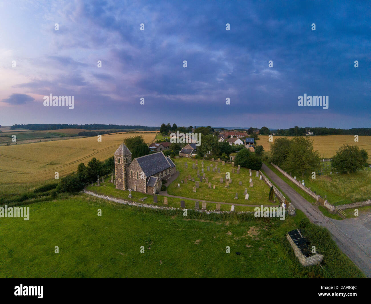 Aerial view of Branxton Church and village in north Northumberland near