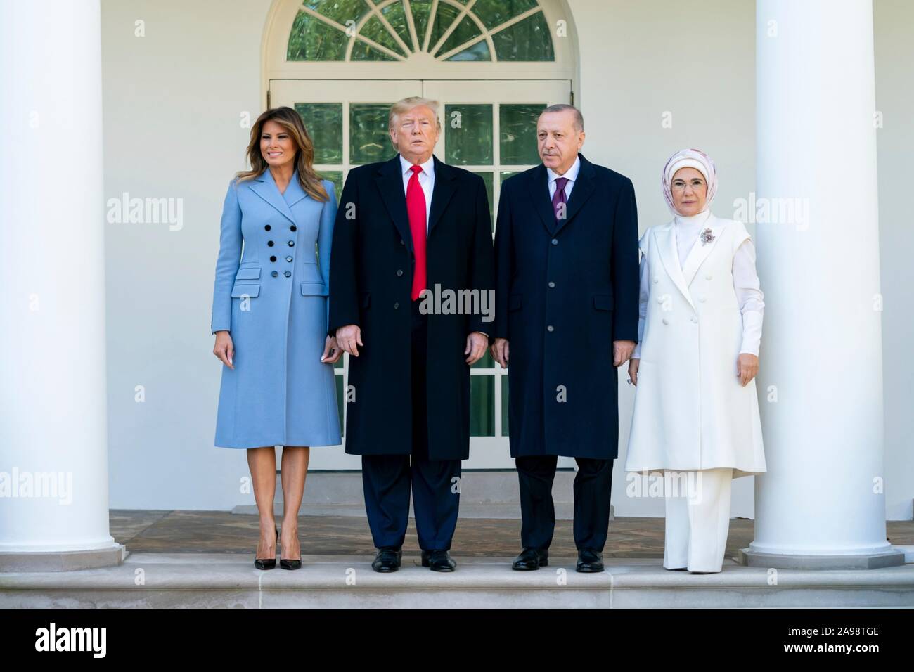 Washington, United States of America. 13 November, 2019. U.S President Donald Trump and First Lady Melania Trump pose with Turkish President Recep Tayyip Erdogan and his wife Emine Erdogan on the West Colonnade of the White House November 13, 2019 in Washington, DC.  Credit: Andrea Hanks/White House Photo/Alamy Live News Stock Photo