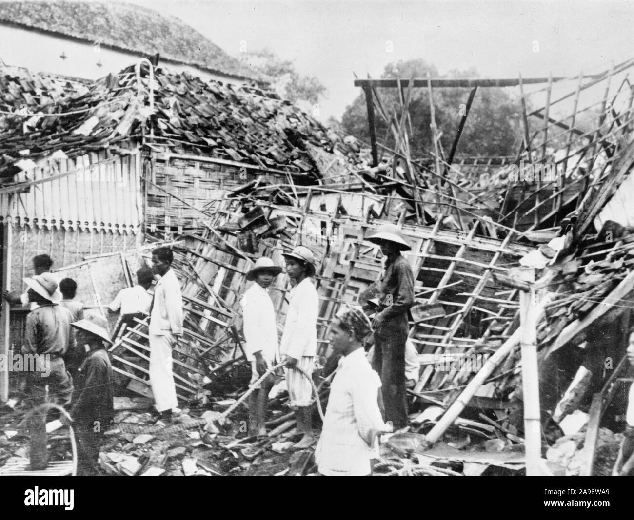 Soerabaja, Java. A house in the native quarter wrecked by a Japanese bomb. February 1942 Stock Photo