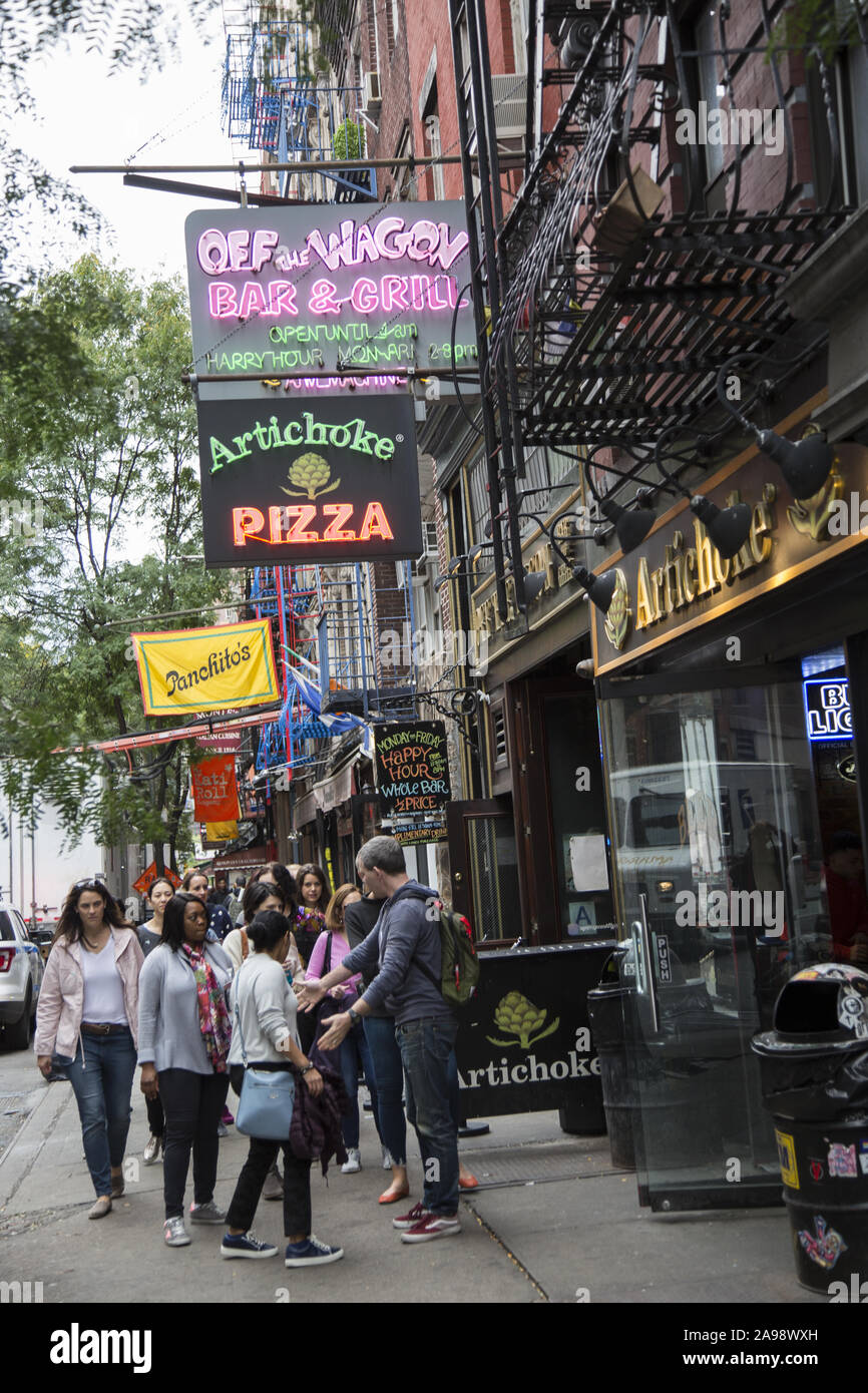 Sidewalk along MacDougal Street in the heart of Greenwich Village, New