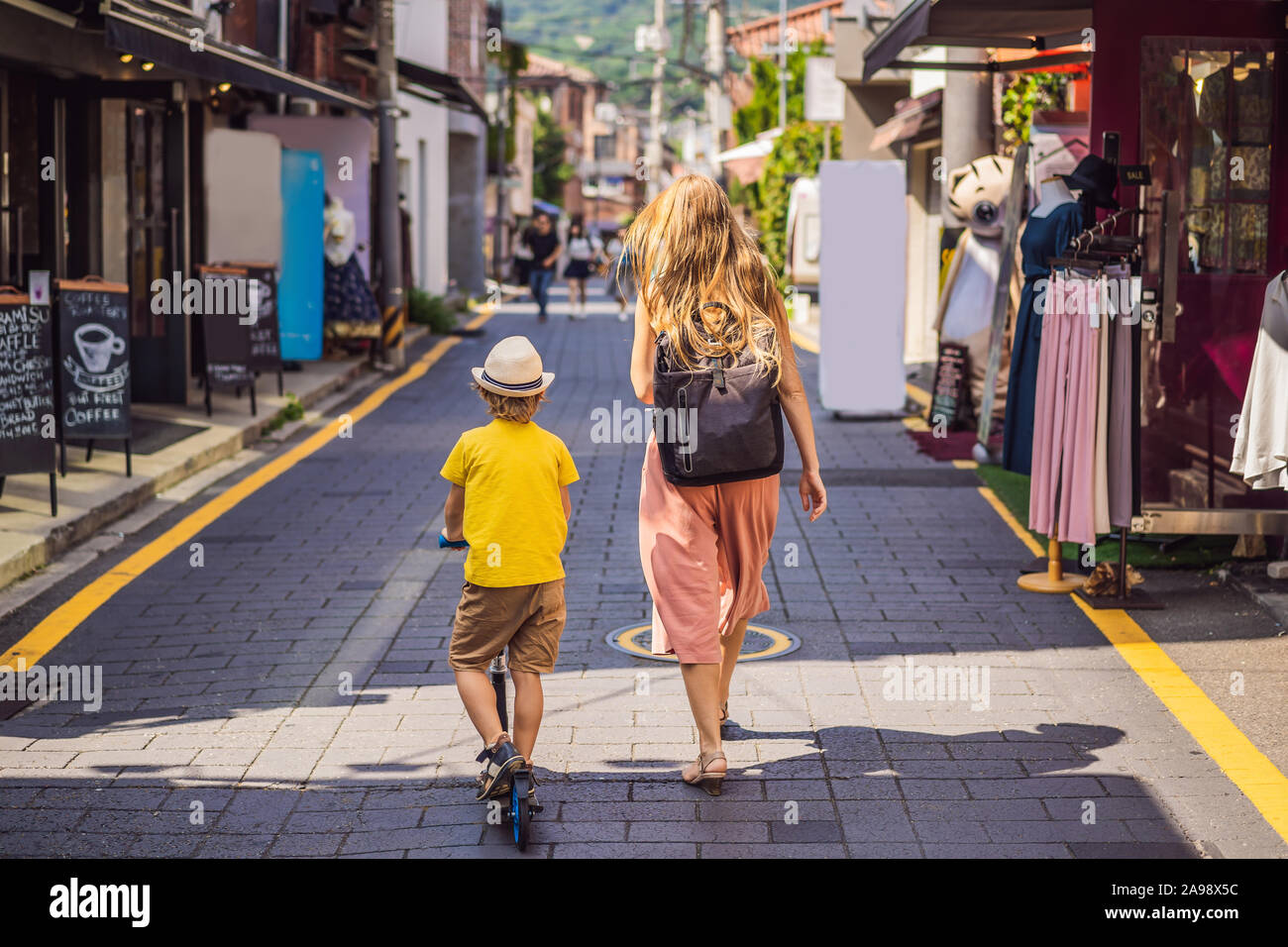 Mom and son tourists in Bukchon Hanok Village is one of the famous ...