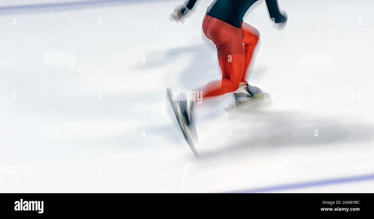 Ice speed skater training for a race Stock Photo Alamy