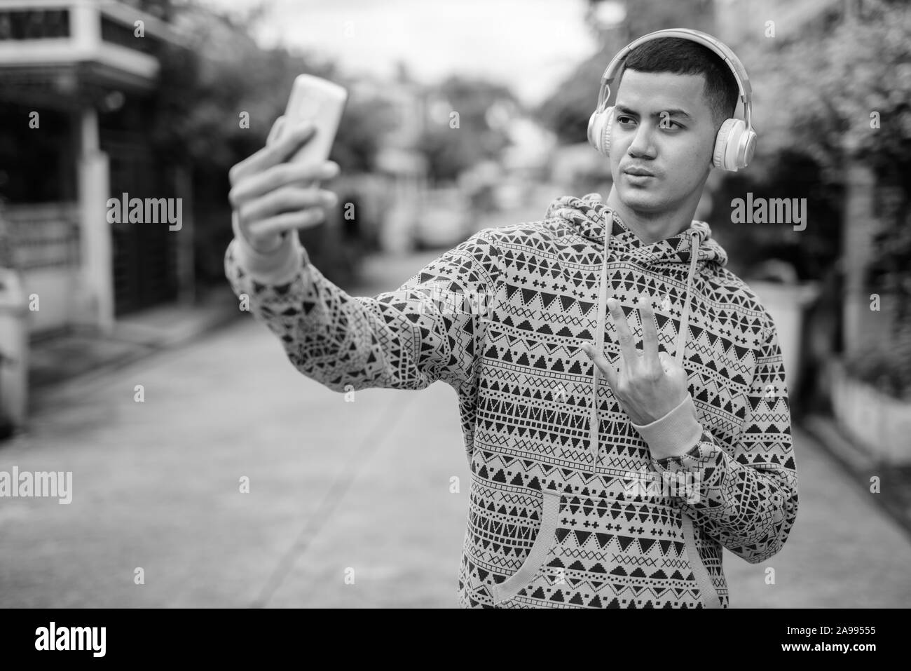 Mixed race man using Black and White Stock Photos & Images - Alamy