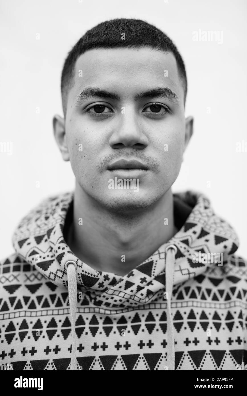 Young multi ethnic Asian man outdoors in black and white Stock Photo ...