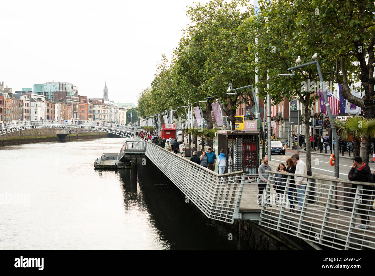 The promenade along the River Liffey and Bachelors Walk, with the dock