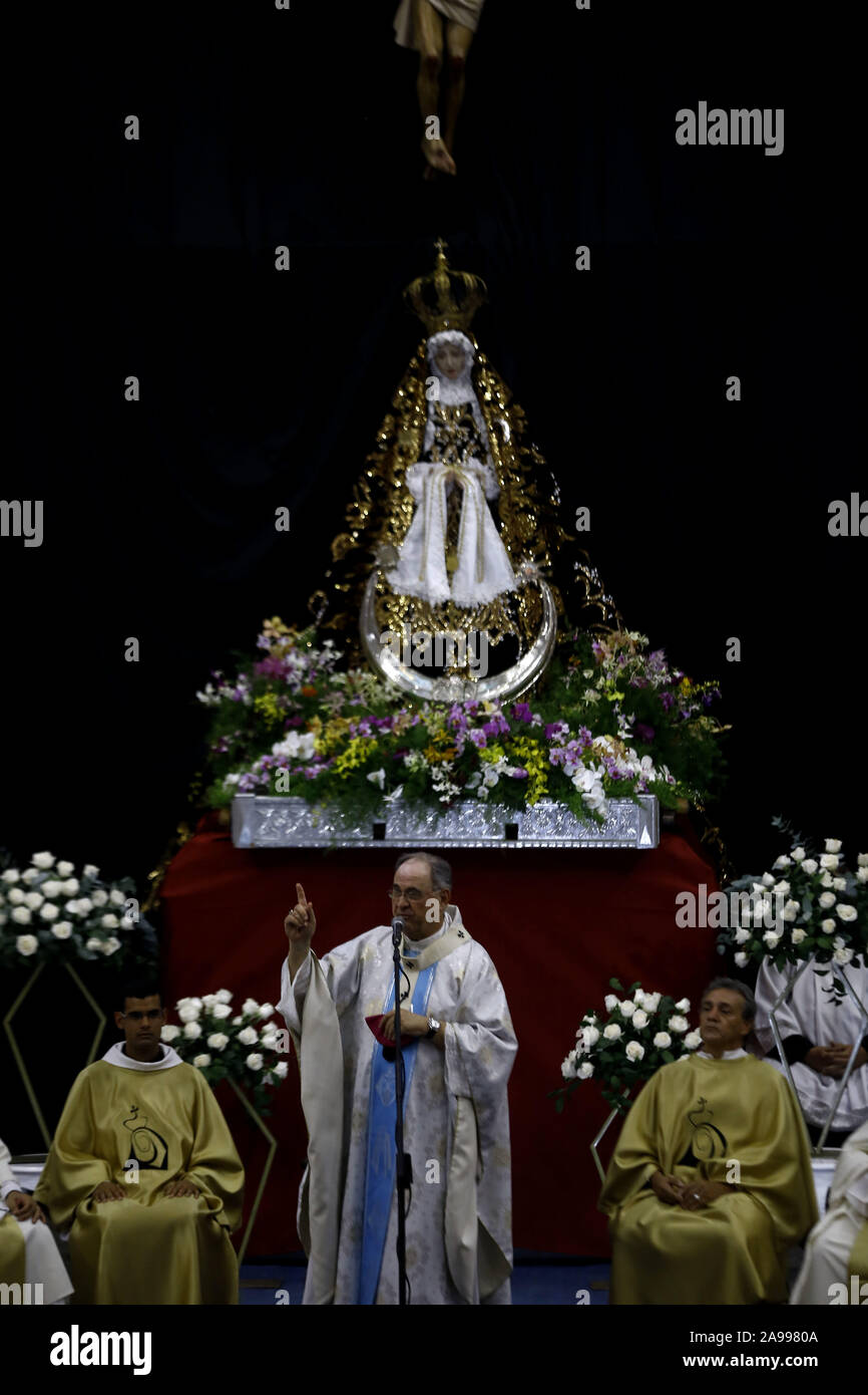 Valencia, Carabobo, Venezuela. 13th Nov, 2019. November 13, 2019. Devotees participate in the realization in the Forum of Valencia, by part of the ecclesiastical authorities of the solemn Mass to commemorate the day of the virgin of the relief, patron of the city of Valencia, Carabobo state. Photo: Juan Carlos Hernandez Credit: Juan Carlos Hernandez/ZUMA Wire/Alamy Live News Stock Photo