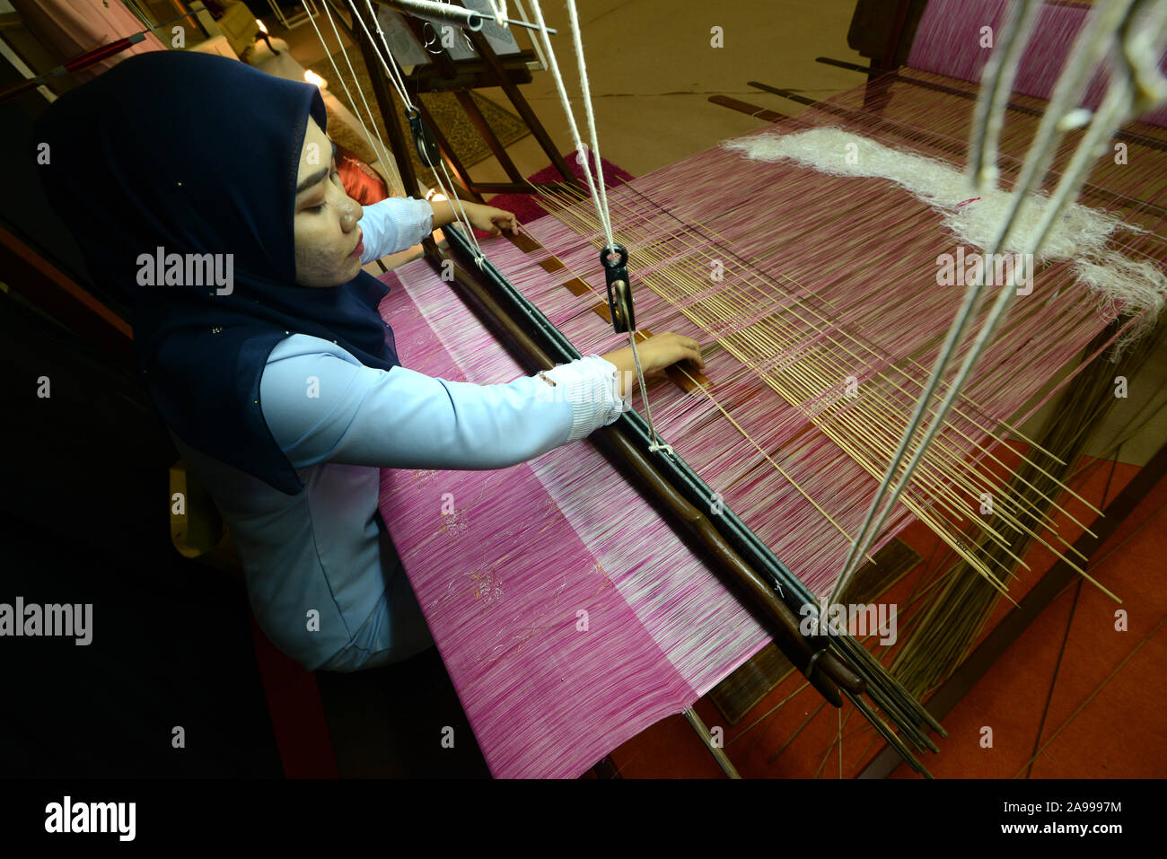 Songket weaving, Terengganu, Malaysia. Stock Photo