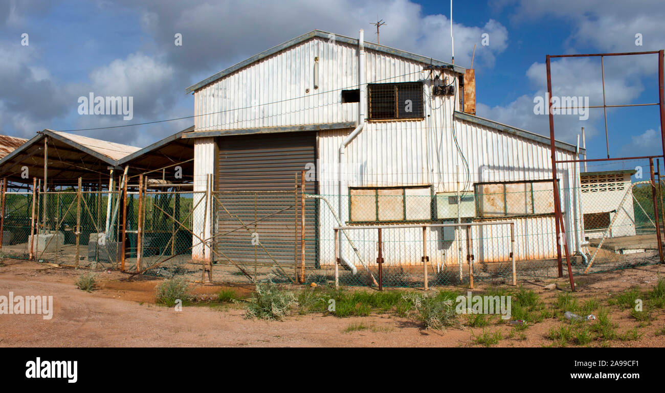 Derelict old open sheds where pearl shells  were sorted and cleaned  a hundred years ago in Broome North Western Australia  stand as a past reminder . Stock Photo