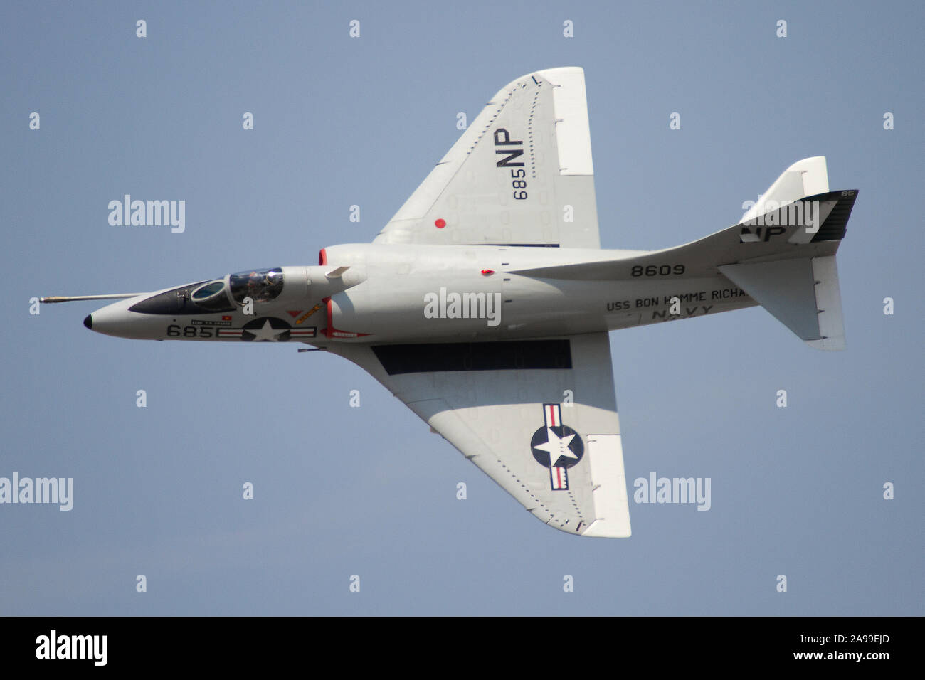 A retired U.S. Navy A-4 Skyhawk performs a demo at the 2012 Vectren Dayton Airshow in Vandalia, Ohio. Stock Photo