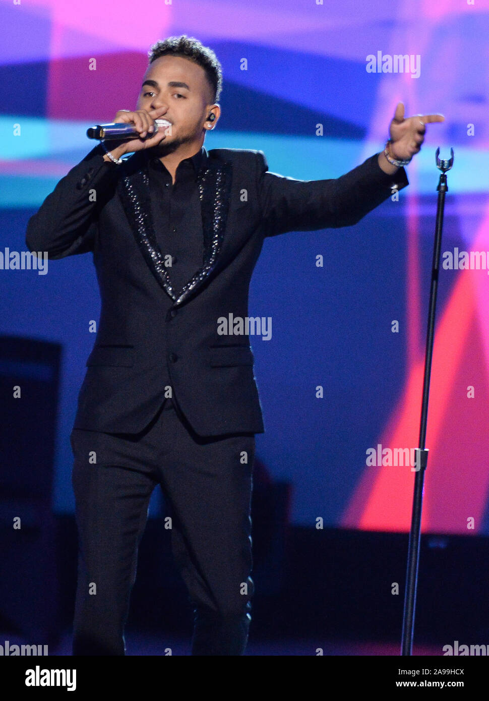 Las Vegas, United States. 13th Nov, 2019. Singer Ozuna performs "La Camisa  Negra" onstage at the Latin Grammy Person of the Year gala honoring  Columbian singer Juanes at the MGM Grand Convention
