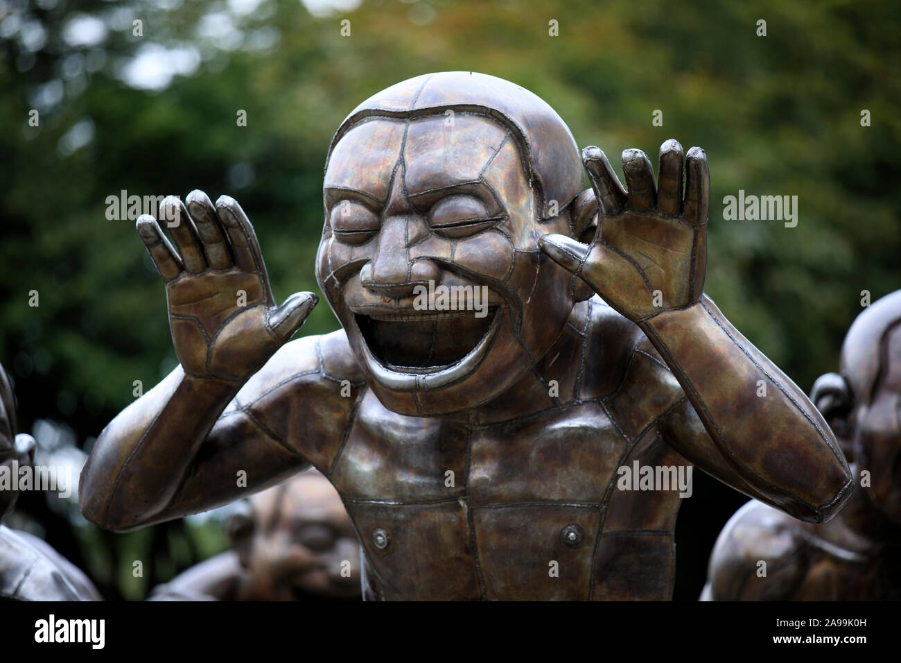 Giant Laughing Statues to stay in English Bay, Vancouver, America Stock