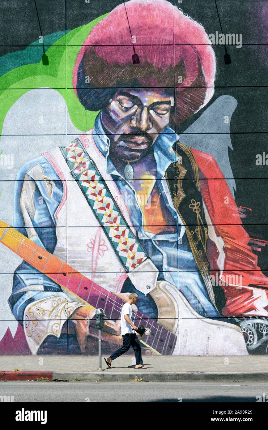 Life-sized mural with Jimi Hendrix at the Guitar Center music store, Sunset Boulevard, Hollywood, Los Angeles, California, USA Stock Photo