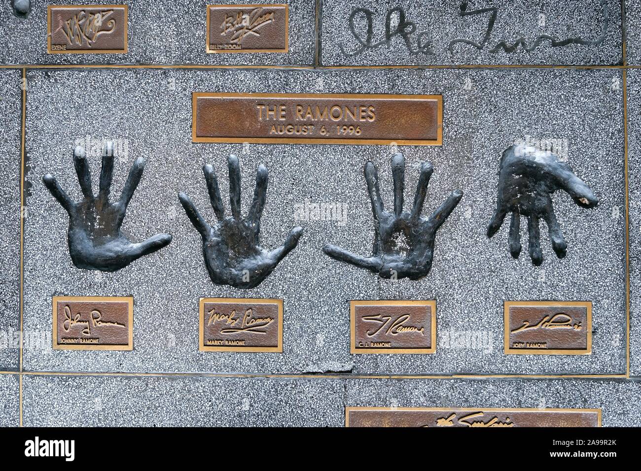 Hands of the band The Ramones with JohnnyMarky, C.J. and Joey Ramone, Rock Walk on Sunset Boulevard, Hollywood, Los Angeles, California, USA Stock Photo