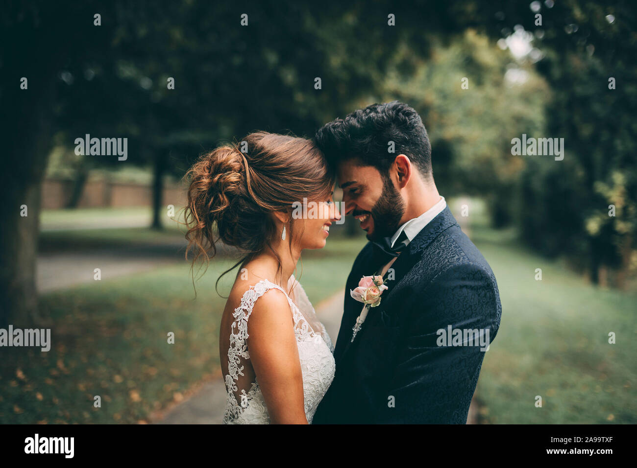 Beautiful happy couple on their wedding day Stock Photo - Alamy