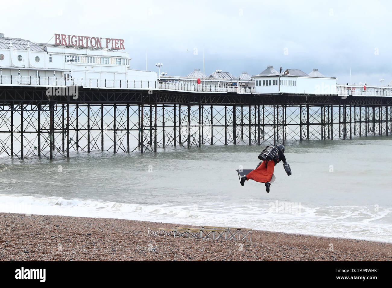 Richard Browning attempts to break his own Guinness World Record for the fastest speed in a body-controlled jet engine powered suit near Brighton Pier. Stock Photo