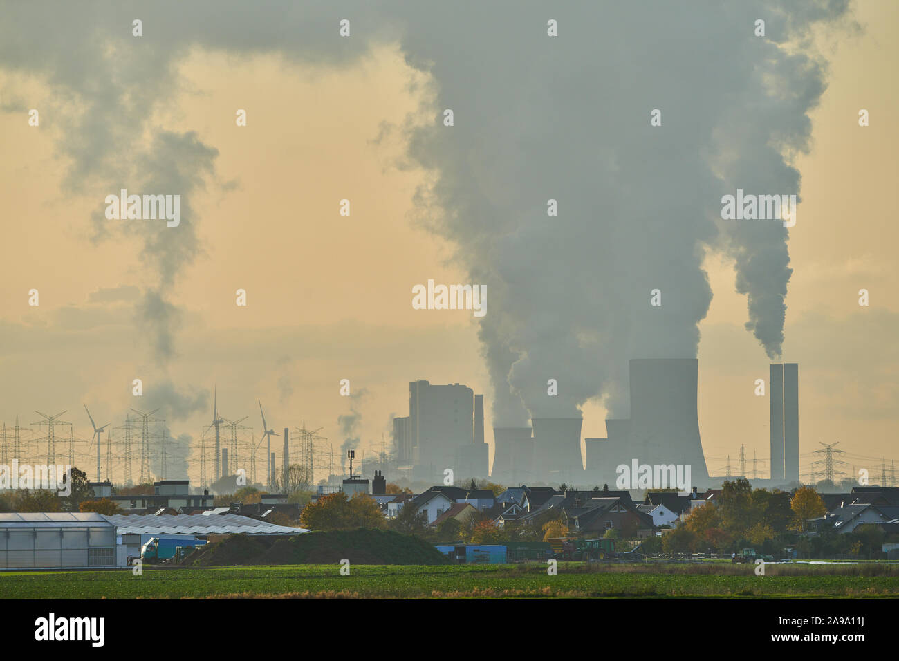 Power stations, Cologne November 8, 2019. The smoking chimneys of the brown coal Power stations RWE Power AG Kraftwerk Frimmersdorf, Neurath and Niede Stock Photo