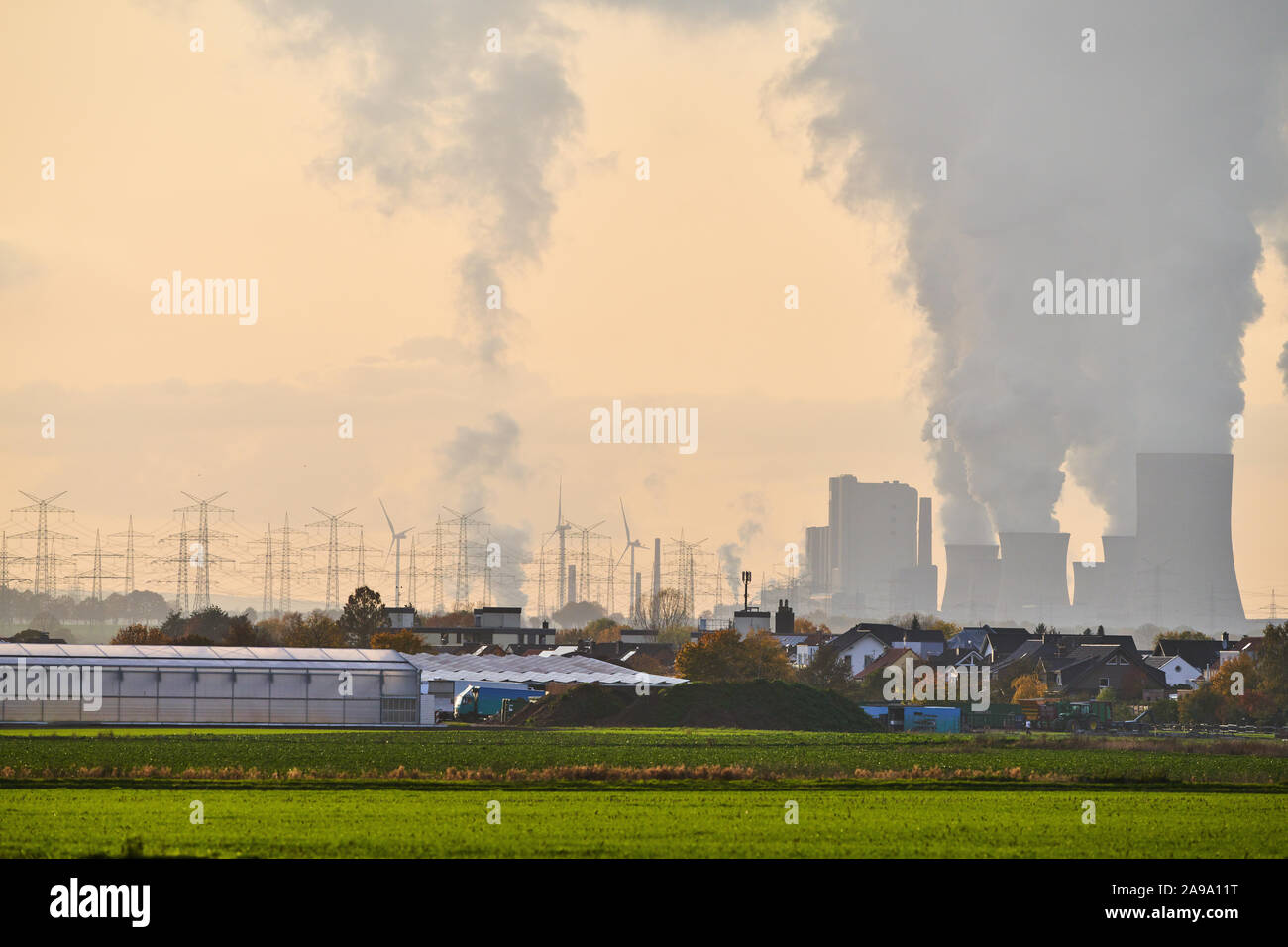 Power stations, Cologne November 8, 2019. The smoking chimneys of the brown coal Power stations RWE Power AG Kraftwerk Frimmersdorf, Neurath and Niede Stock Photo