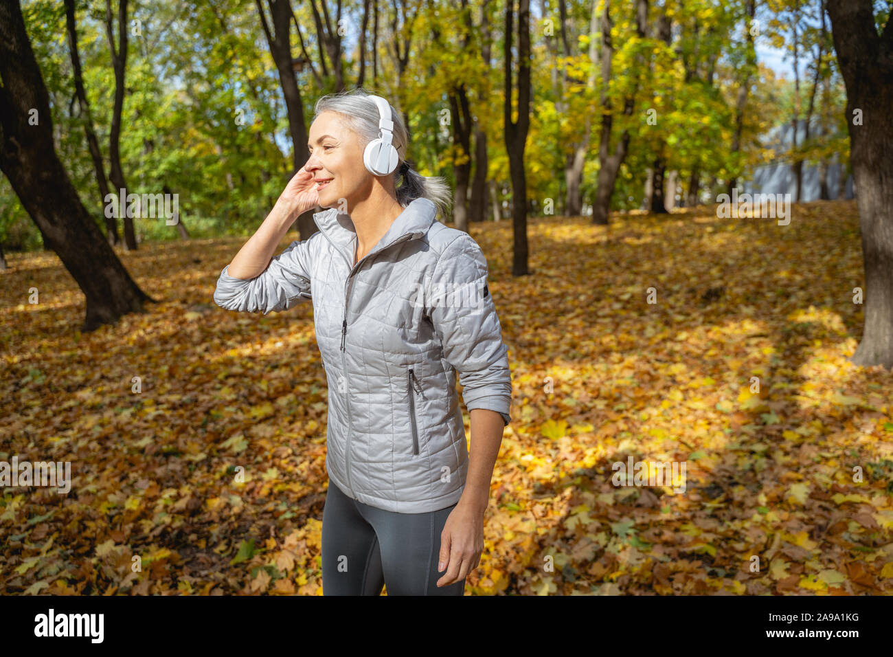 Stylish mature woman standing hi-res stock photography and images - Alamy