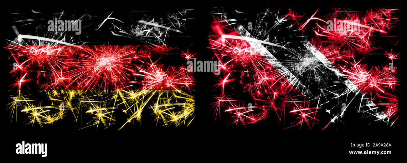 Germany, German vs Trinidad and Tobago New Year celebration travel sparkling fireworks flags concept background. Combination of two abstract states fl Stock Photo