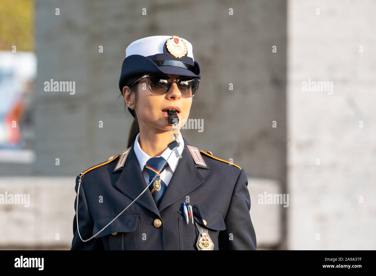 Female policewoman regulates traffic hi-res stock photography and ...