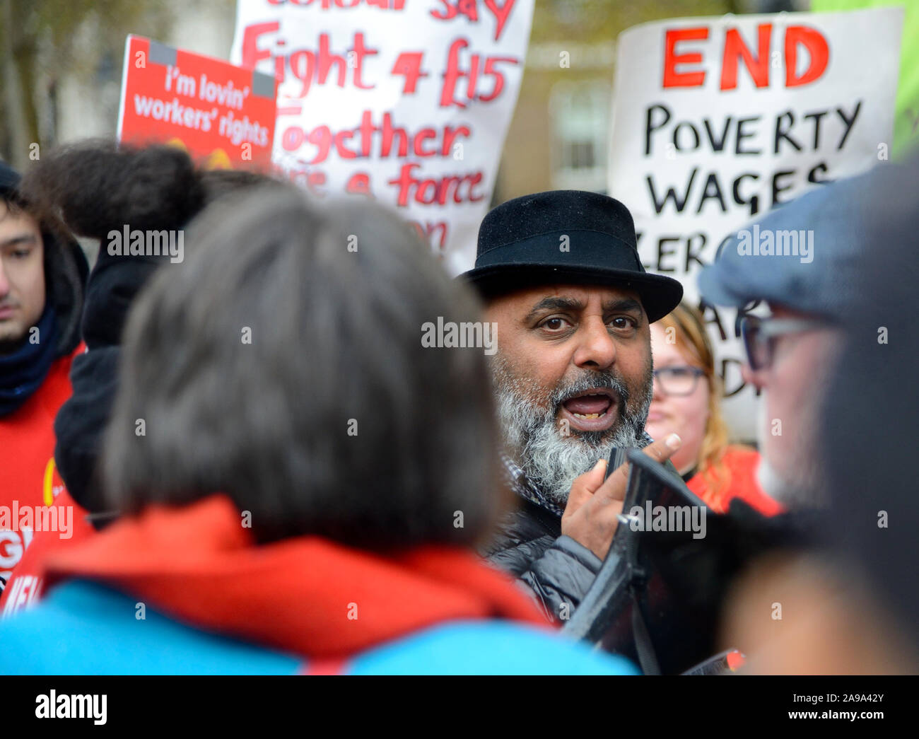 Asad Rehman - Executive Director at War on Want and 'General activist against all bad things'  - speaking to striking MacDonalds employees, 12th Nov 2 Stock Photo