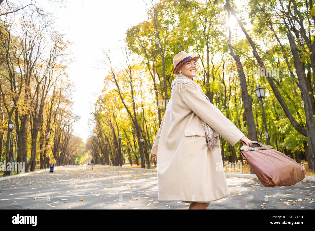 Mature lady standing on street hi-res stock photography and images - Alamy