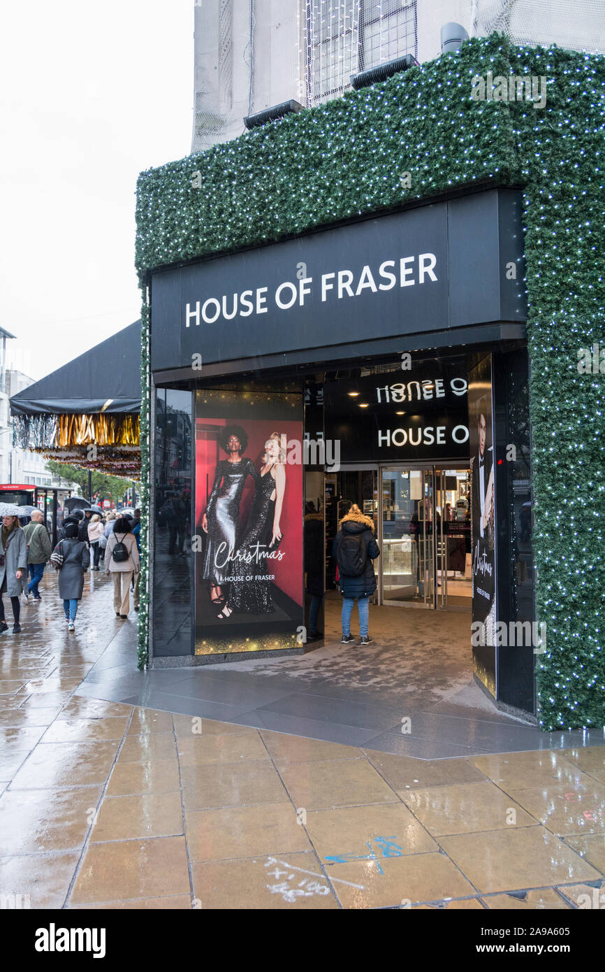 Christmas decorations outside the House of Fraser entrance on Oxford Street, London, UK Stock