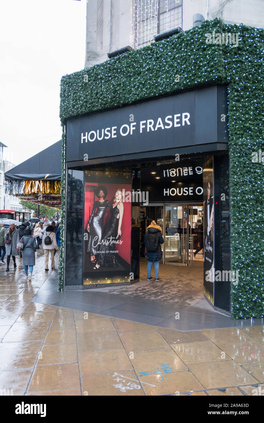 Christmas decorations outside the House of Fraser entrance on Oxford Street, London, UK Stock Photo