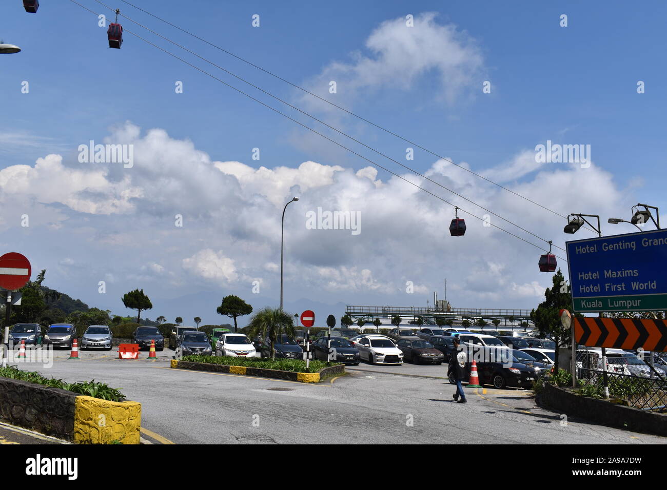 cars parked with blue sky horizon in Genting highlands Stock Photo
