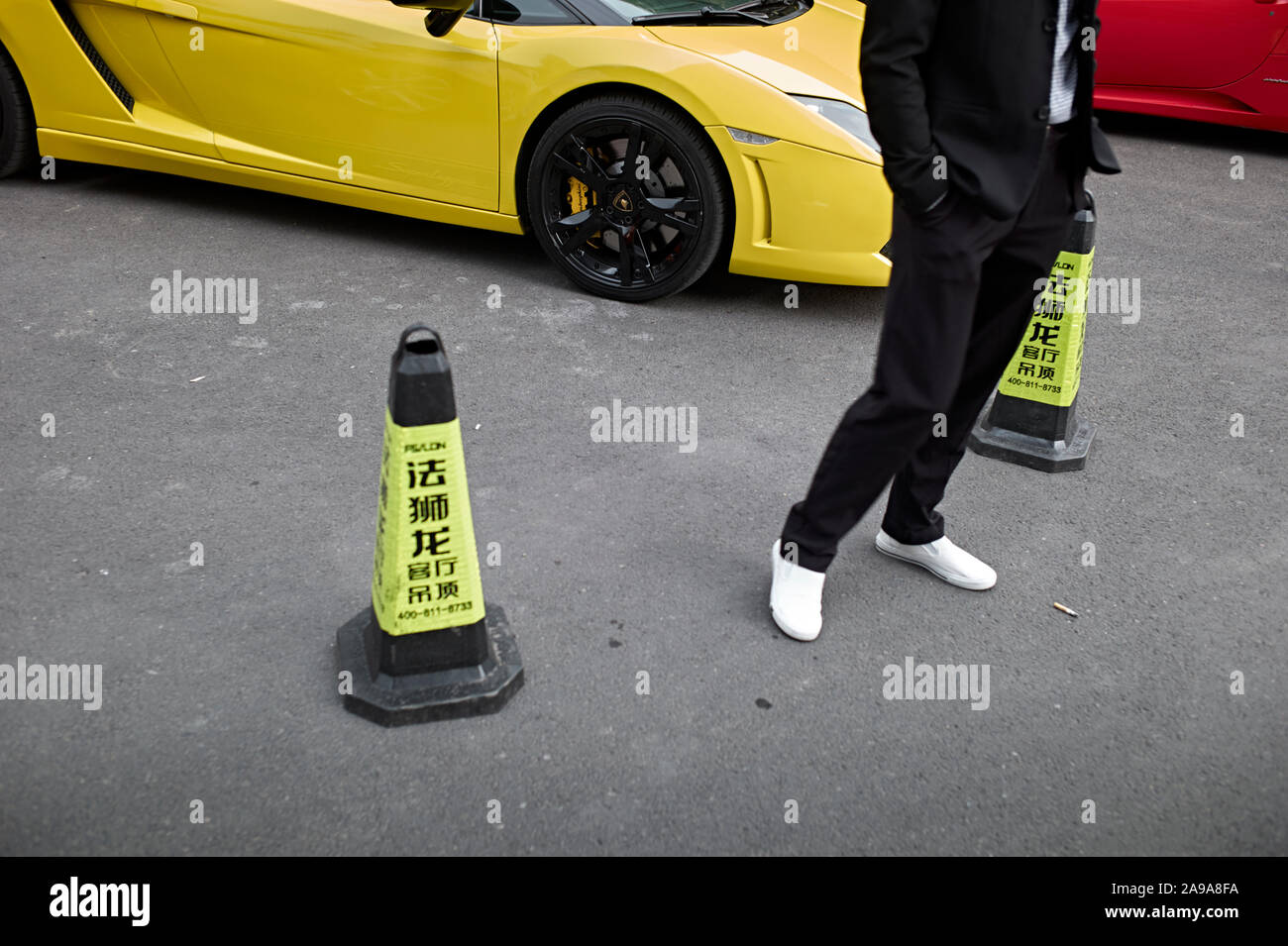 Ferrari cars for sale Street scene from Lishui, Zhejiang Province China, Stock Photo