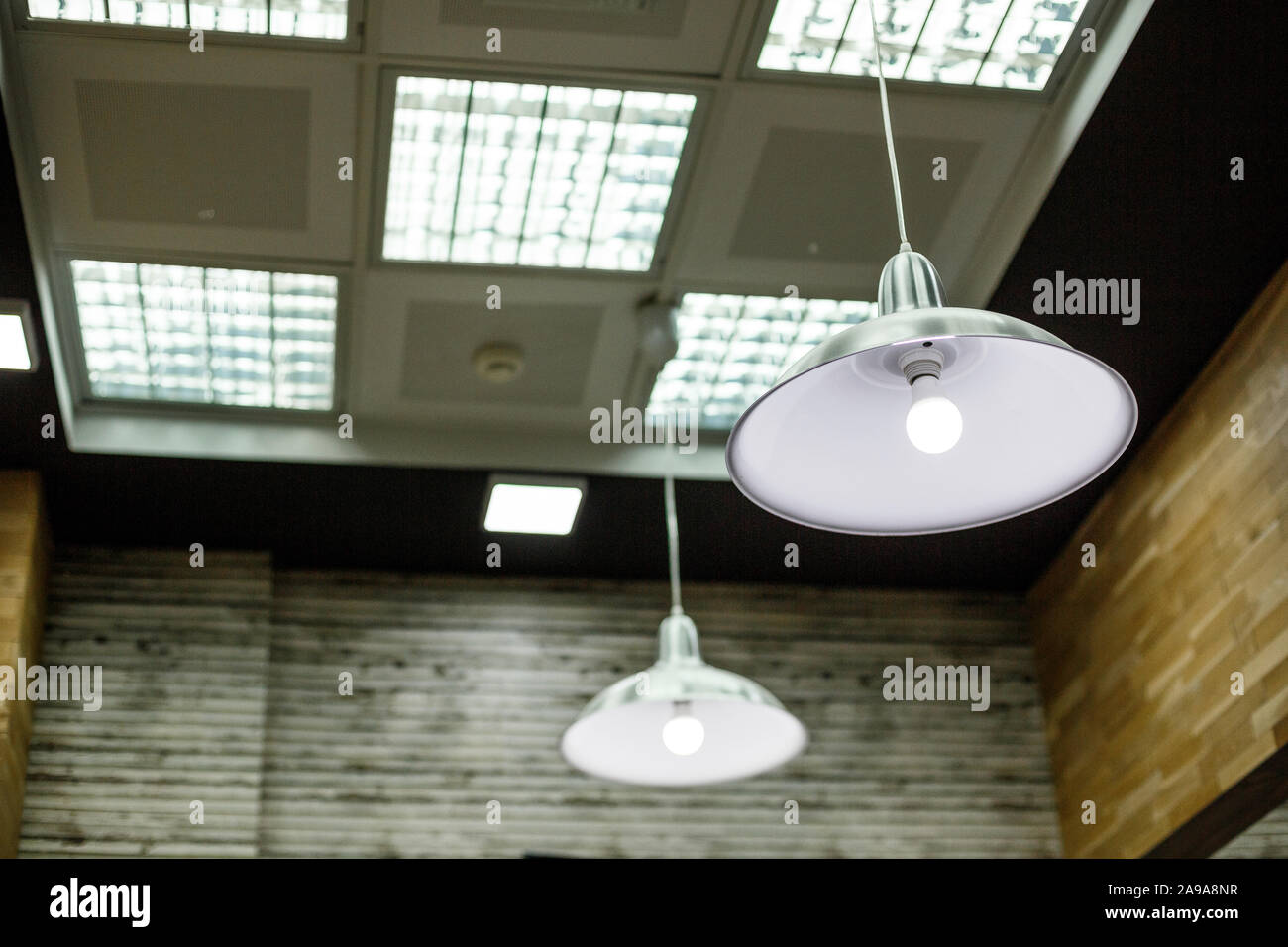 stylish lights on the ceiling of the Barber shop. shallow depth of field, selective focus Stock