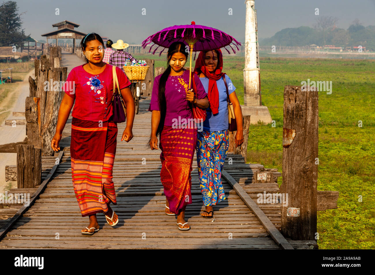 Women crossing small bridge hi-res stock photography and images - Alamy