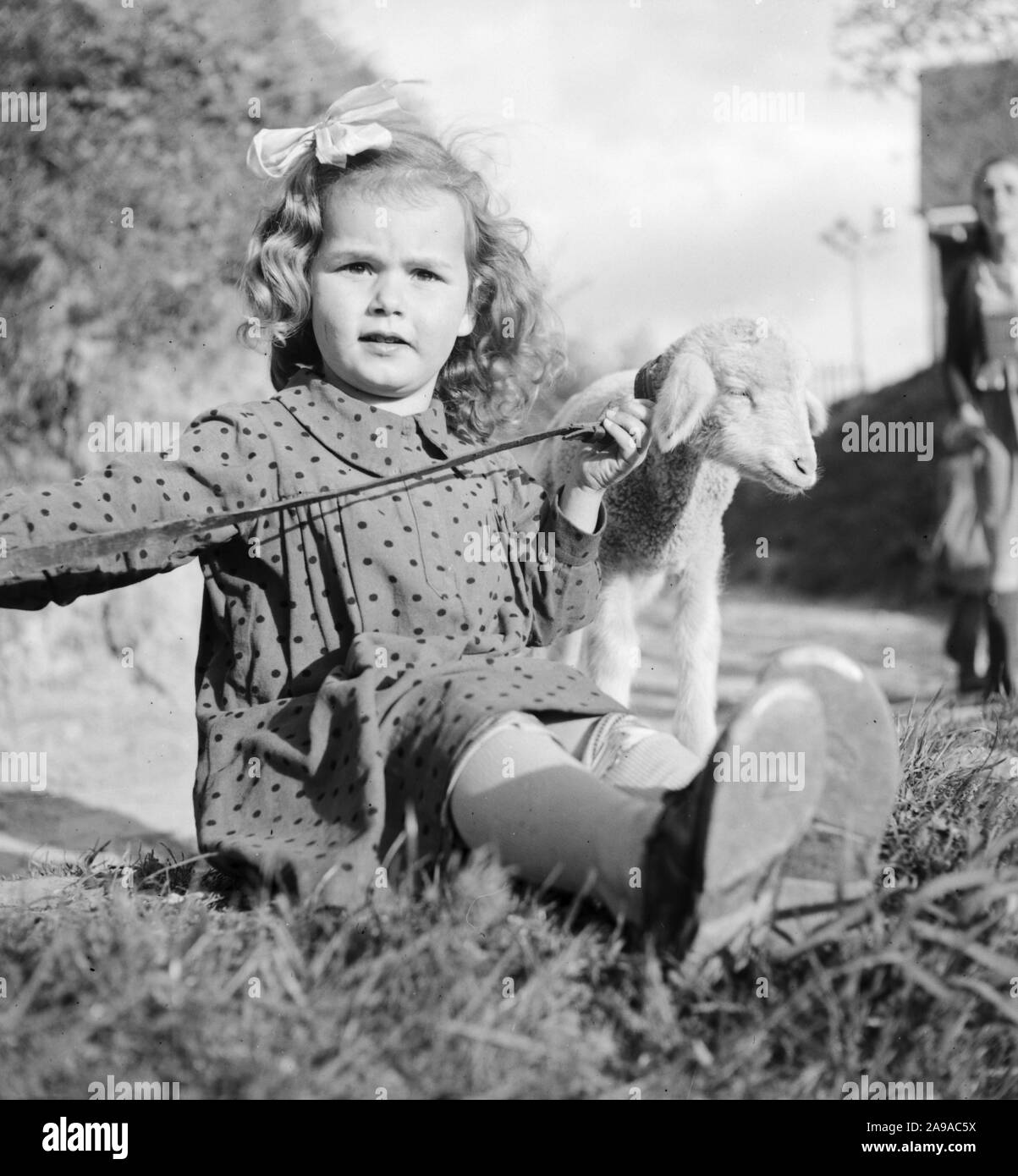 Boy with a lamb Black and White Stock Photos & Images - Alamy