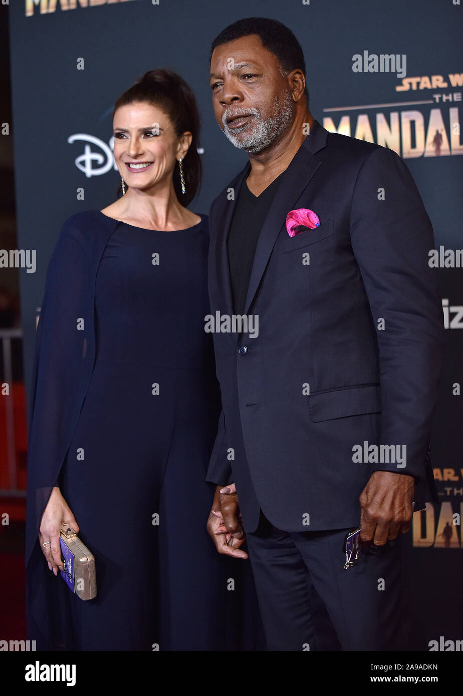 Los Angeles, United States. 13th Nov, 2019. Carl Weathers (R) and Christine Kludjian arrive for the premiere of Disney 's 'The Mandalorian' at the El Capitan Theatre in Los Angeles, California on Wednesday, November 13, 2019. Photo by Chris Chew/UPI Credit: UPI/Alamy Live News Stock Photo
