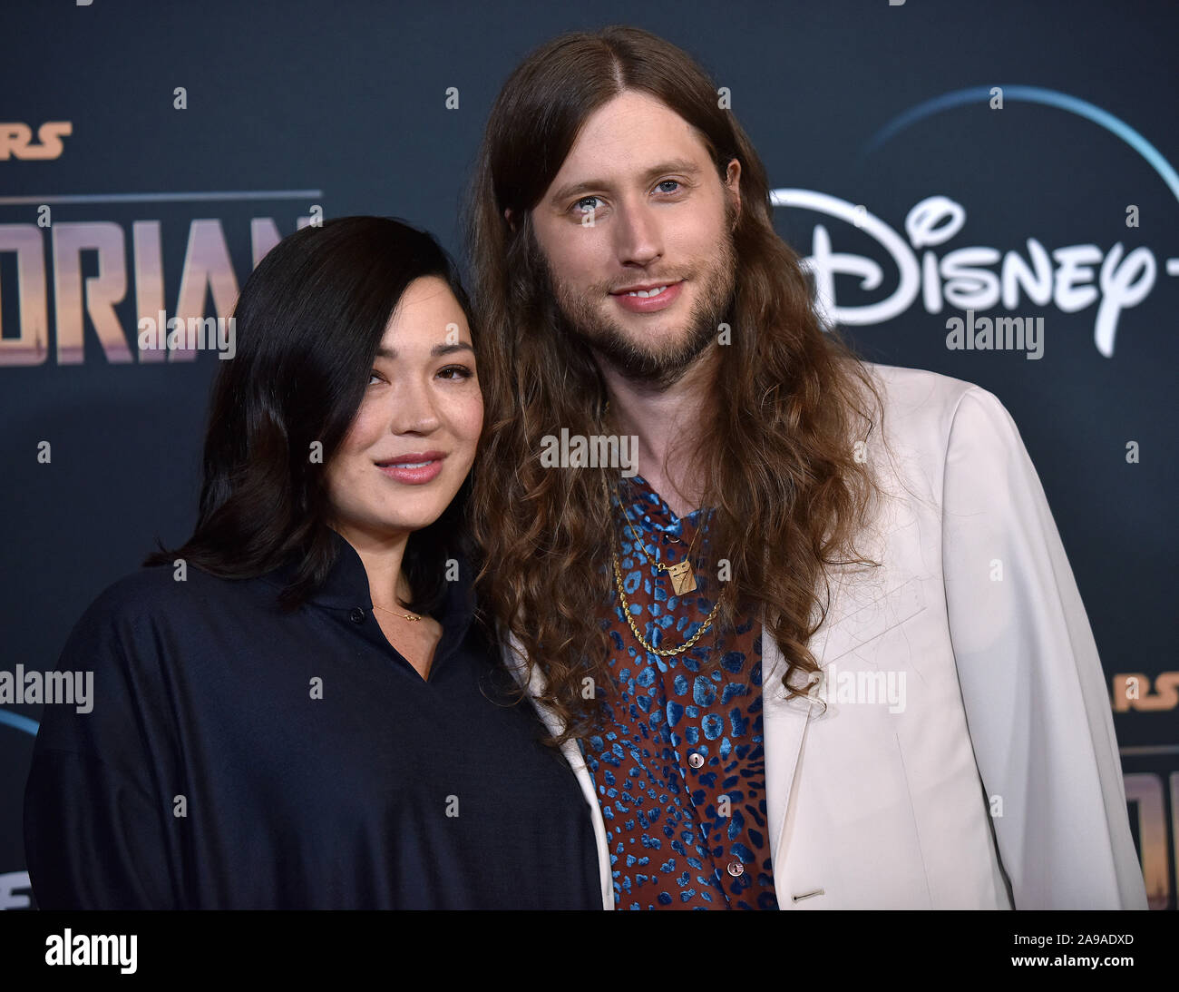 Los Angeles, United States. 13th Nov, 2019. Composer Ludwig Goransson (R) and his wife violinist Serena McKinney arrive for the premiere of Disney 's 'The Mandalorian' at the El Capitan Theatre in Los Angeles, California on Wednesday, November 13, 2019. Photo by Chris Chew/UPI Credit: UPI/Alamy Live News Stock Photo