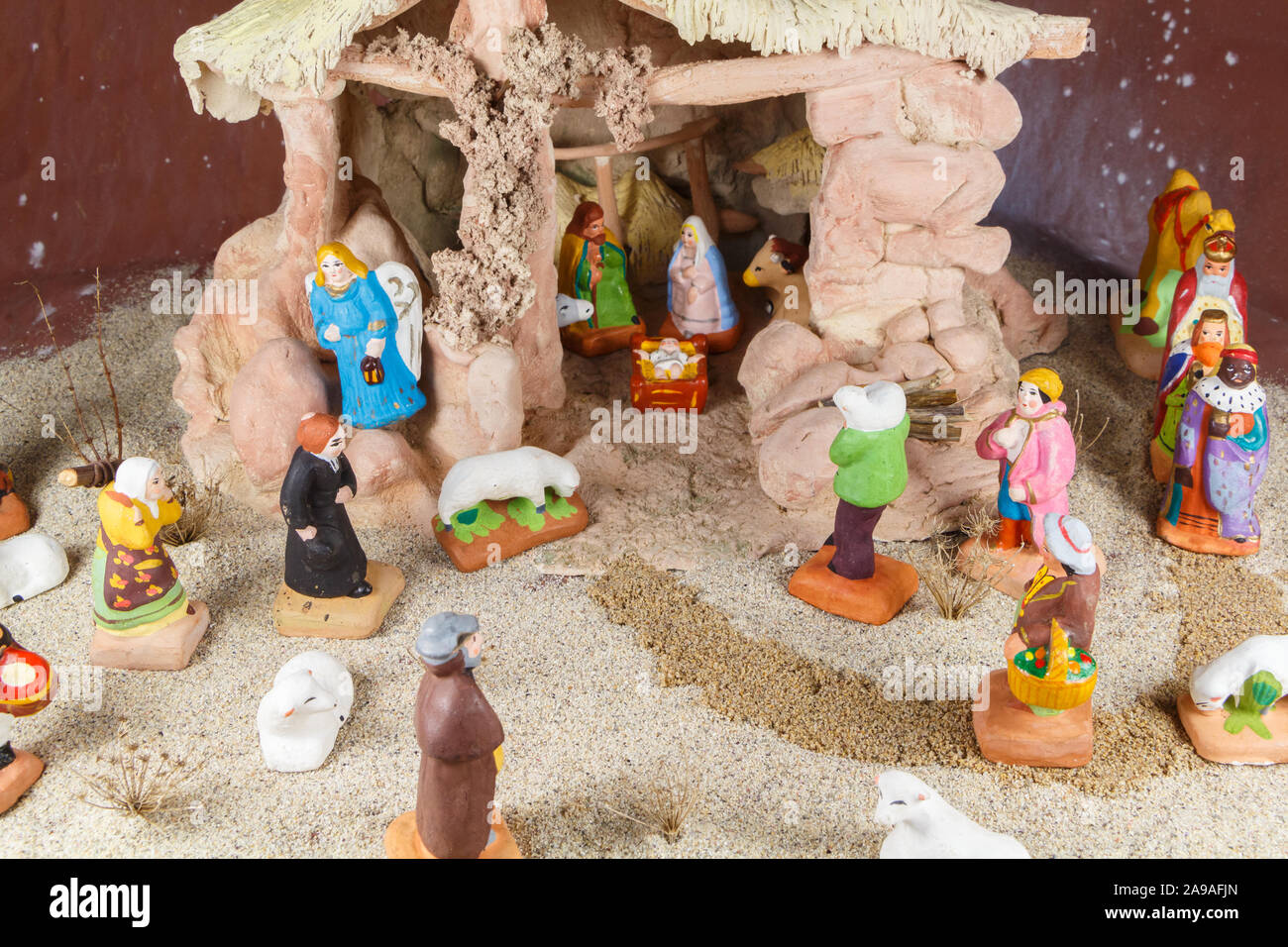 Nativity scene with provencal painted Christmas crib figures in ...