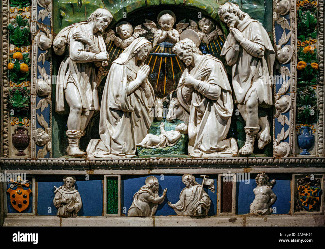 Italy Tuscany Bibbiena -  Church of San Lorenzo -  Birth of the Savior: Glazed terracotta by Andrea della Robbia Stock Photo