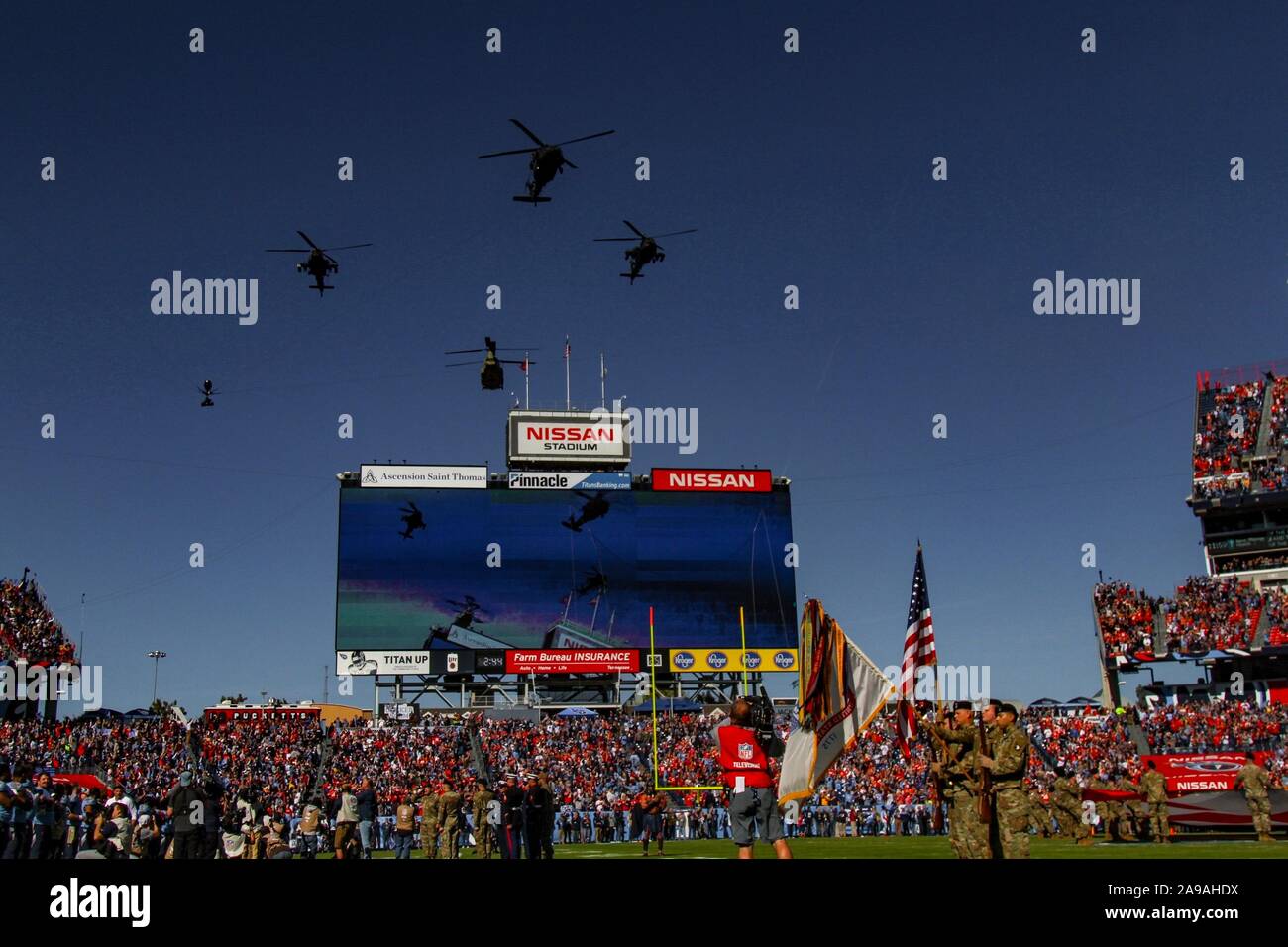 Soldiers of the 101st Combat Aviation Brigade, 101st Airborne Division (Air Assault), fly over Nissan Stadium during the Tennessee Titans' Salute to Service Military Appreciation Game Nov. 10, Nashville, Tn. The Salute to Service game is the National Football League’s way to say thank you to the men and women serving in the United States military past and present. (US Army photo by Spc. Jeremy Lewis 40th Public Affairs Detachment) Stock Photo