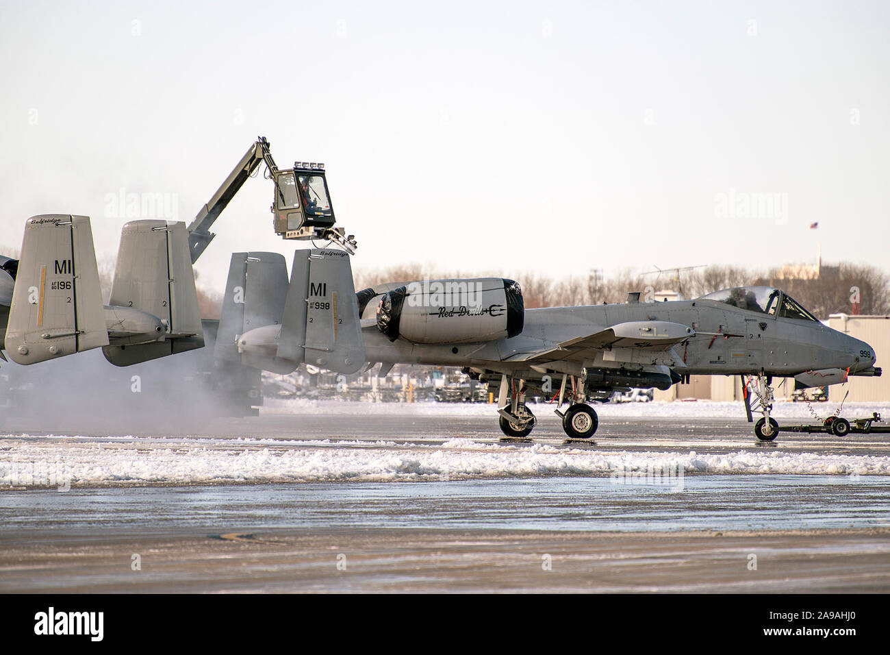 127th Maintenance Group Airmen deice an A-10 Thunderbolt II on the ...