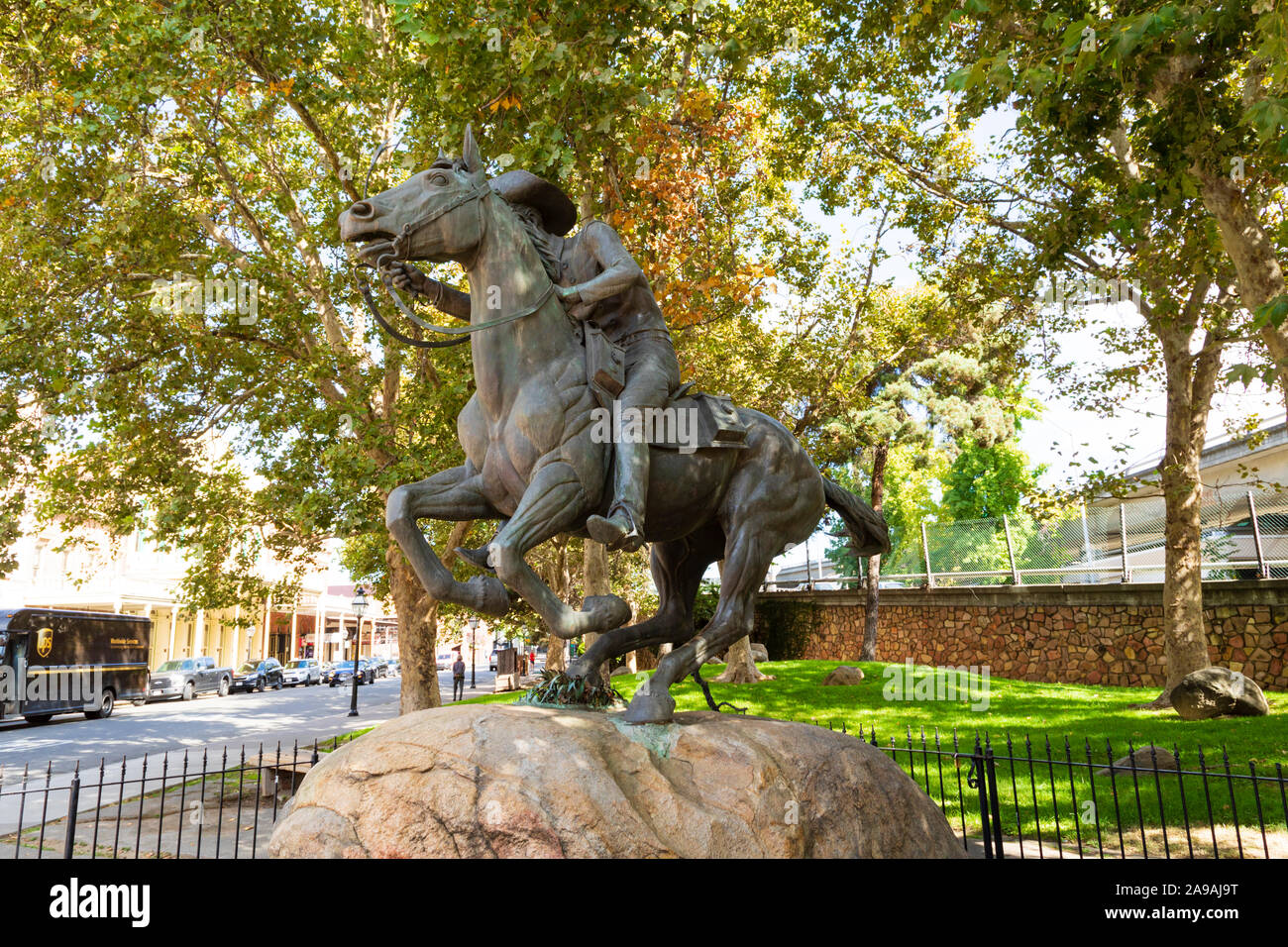 Pony Express monument statue, Second and J Street, Old Town, Sacramento, California, United States of America. USA Stock Photo