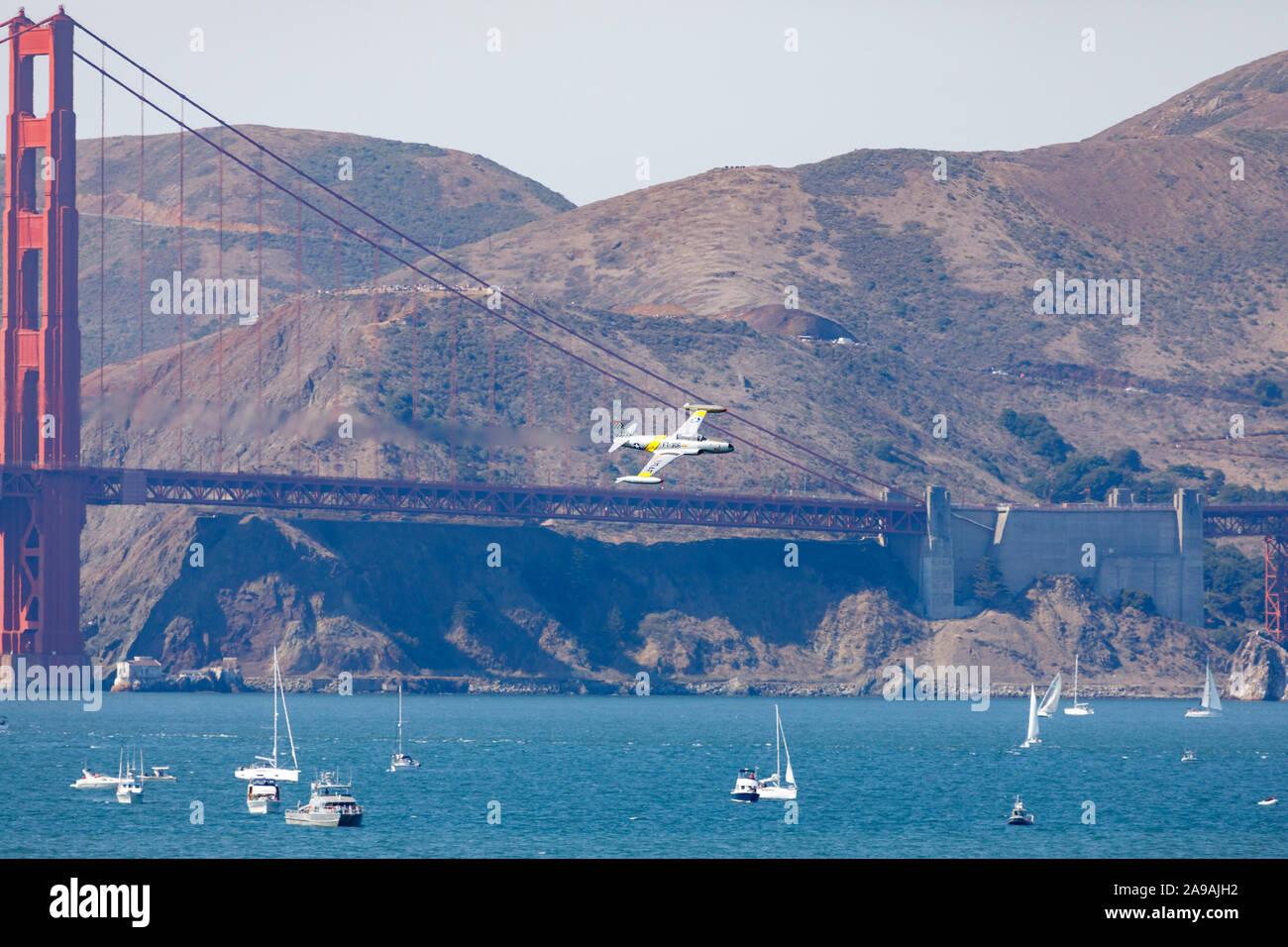 Private owned Canadair T33-AN Silver Star in USAF colours displays over the Golden Gate Bridge during fleet Week 2019. San Francisco Bay, California, Stock Photo