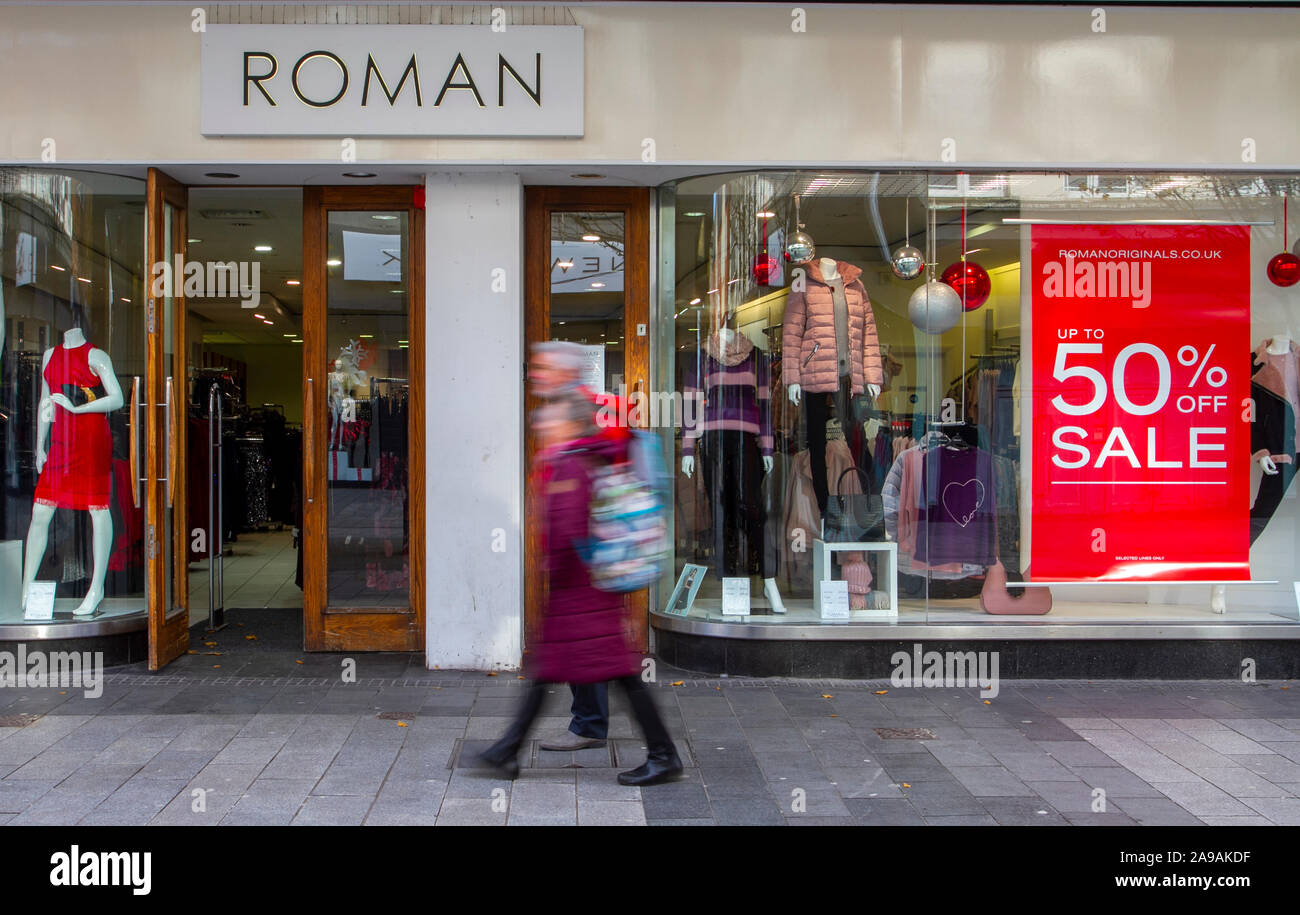People passing ROMAN dress Shop in Chapel Street, Central Business District  of Southport, Merseyside, UK Stock Photo - Alamy