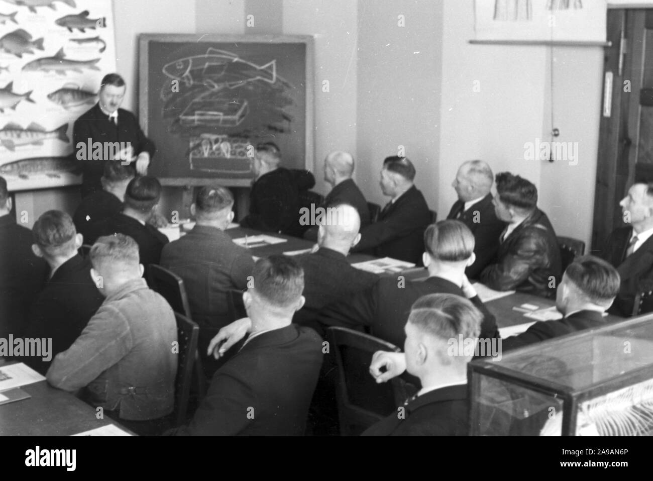 Fishery engineers doing a tutorial at the Reichsanstalt fuer Fischerei in Berlin, Germany 1930s. Stock Photo